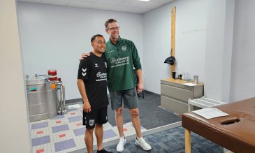 SWH Palmdale doctor and AV ALTA FC Player smiling for the camera in the Palmdale Rehabilitation Institute